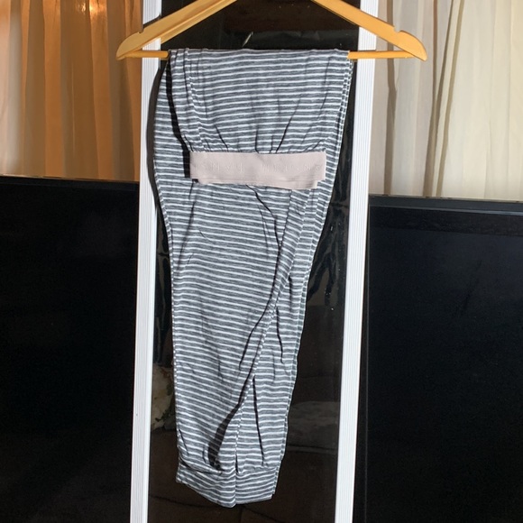 Gray and white Striped pyjama pants with pink waistband. - Picture 3 of 3